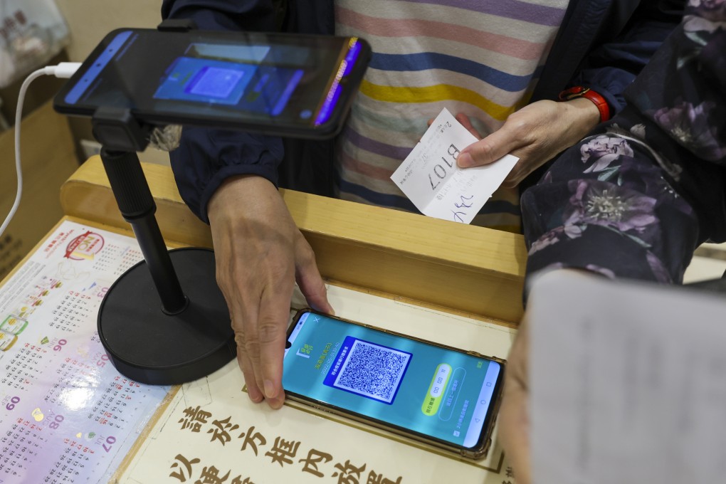 Hong Kong’s “Leave Home Safe” Covid-19 risk-exposure app soon will show red and yellow codes that deny users access to specific places. Photo: Yik Yeung-man