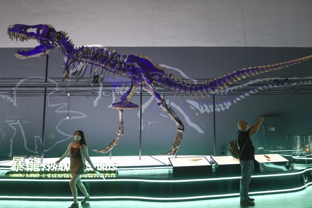 The Big Eight dinosaur exhibition warns about the impacts of climate change by displaying fossil specimens including a Tyrannosaurus rex and a Triceratops. Photo: Nora Tam