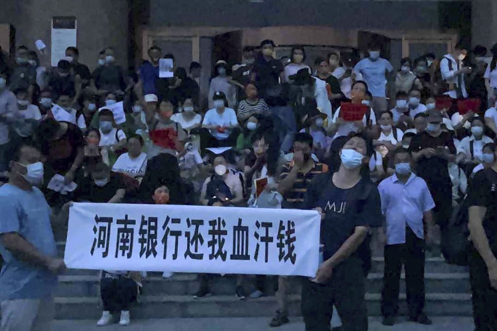 People attending Sunday’s protest by bank depositors in Zhengzhou, capital of central China’s Henan province say they have been contacted by their local police after returning home. Photo: AP
