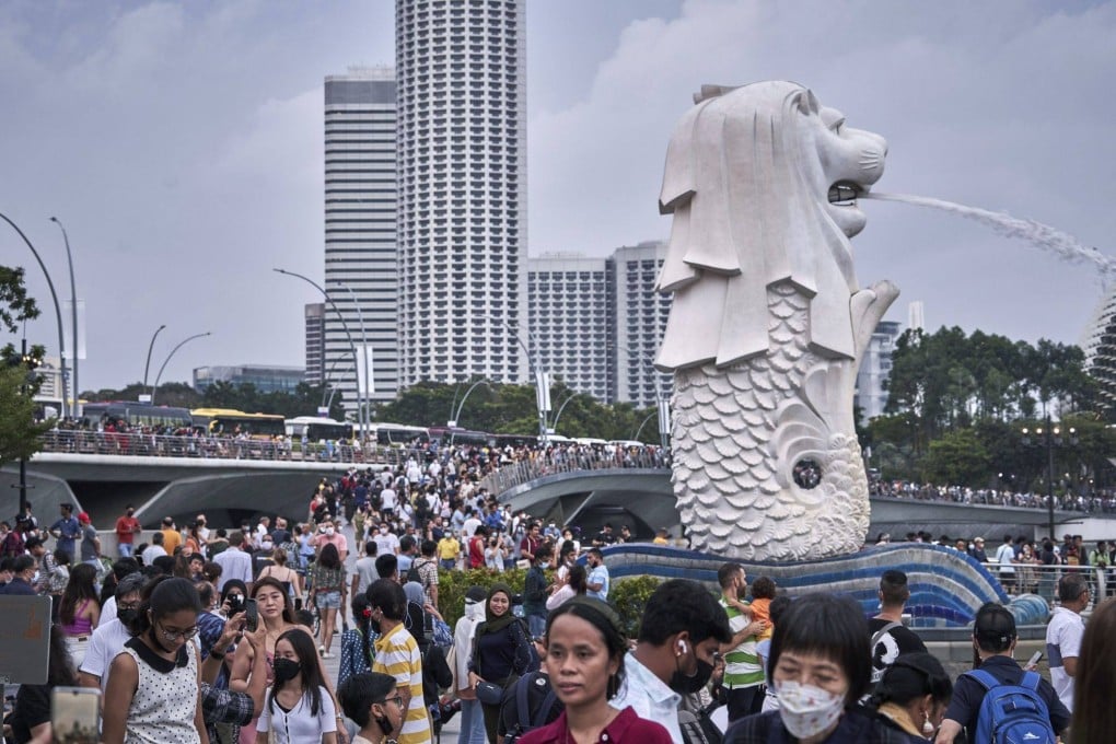 Crowds by the waterfront in Singapore on July 9. Photo: Bloomberg