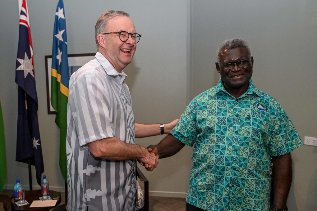 Australian Prime Minister Anthony Albanese (left) greets Solomon Islands leader Manasseh Sogavare during a meeting at the Pacific Islands Forum in Suva, Fiji, on July 13. Photo: AFP