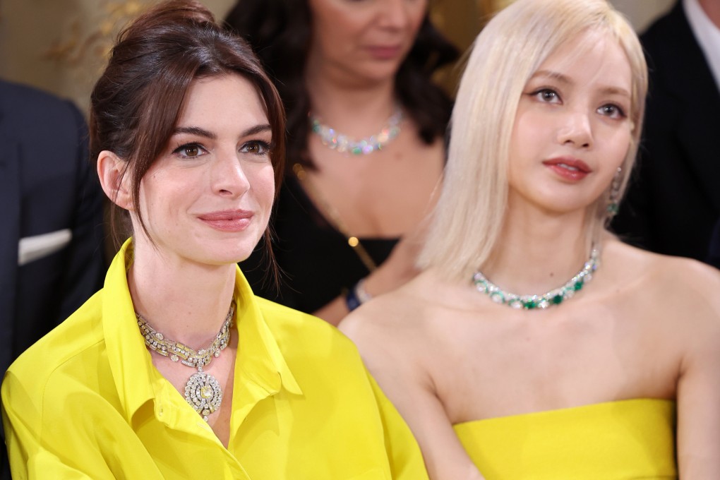 Anne Hathaway (left) and Blackpink’s Lisa, pictured at a Bulgari party in Paris in June, are among the celebrities spotted in shades of yellow this summer. Photo: Getty Images