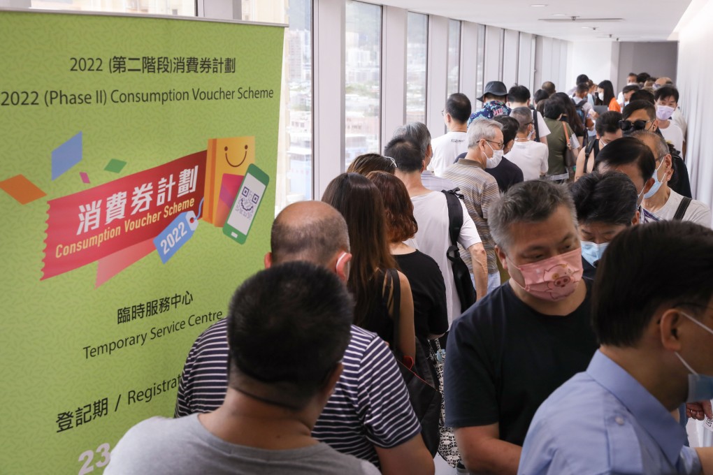 Residents queue up at the consumption voucher service centre in Mong Kok on Friday after learning they are not eligible for the second tranche of e-coupons. Photo: Yik Yeung-man