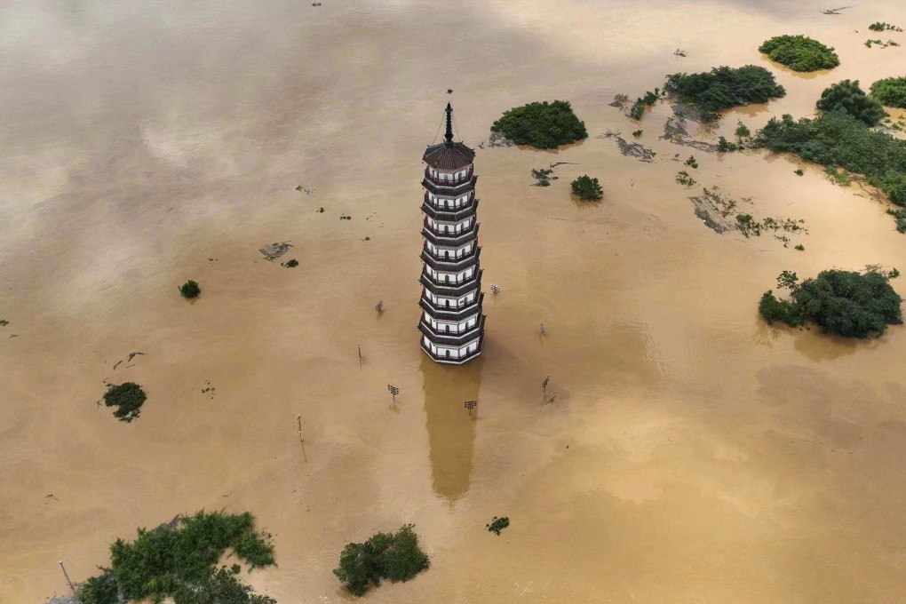 Wenfeng Tower is submerged in flood water after torrential rains on June 22, 2022, in Qingyuan, in China’s Guangdong province. Photo: Getty