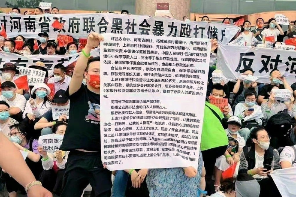 Rural savers have taken to the streets in Zhengzhou, the capital of China’s central Henan province, after finding that their deposits at five banks have been frozen since mid-April. Photo: Weibo