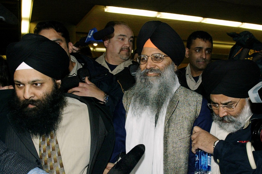 Ripudaman Singh Malik smiles as he leaves a Vancouver court in March 2005 after being found not guilty in the 1985 bombing of an Air India flight off the Irish coast. Photo: Reuters