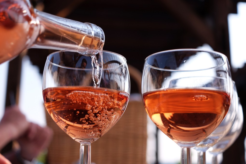 Rosé wine is poured into glasses at Weingut Klosterhof Töplitz, Germany in 2016. Despite its bad rep, there are rosé wines that have just as much depth and flavour as a classy red or white. Photo: Getty Images