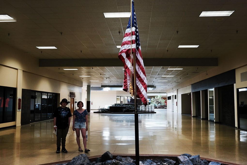 Two teenagers in a ‘zombie mall’ in Frackville, Pennsylvania. The demise of the American shopping mall means fewer social spaces built to meet a human need, an architectural critic says. Photo: Getty Images
