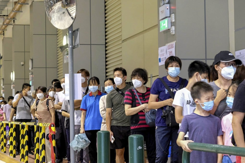 Macau residents line up for coronavirus testing. Photo: Reuters