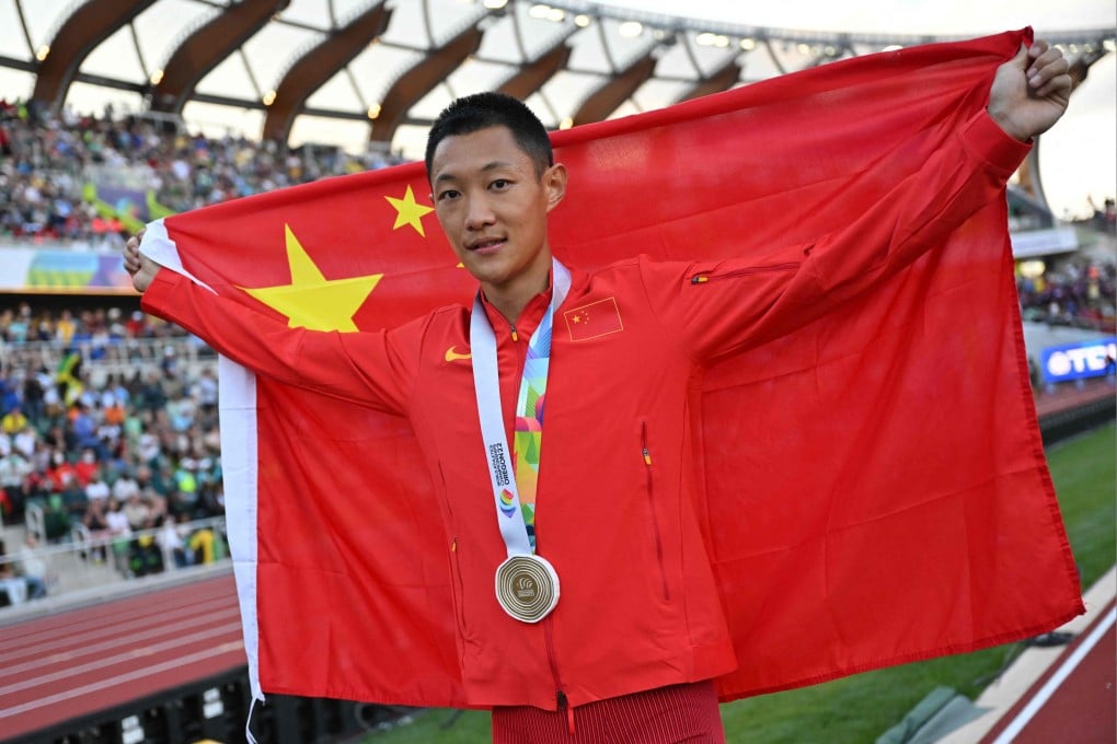 Gold medallist Wang Jianan of China celebrates after winning the men’s long jump final at the World Athletics Championships at Hayward Field in Eugene, Oregon on July 16, 2022. Photo: AFP