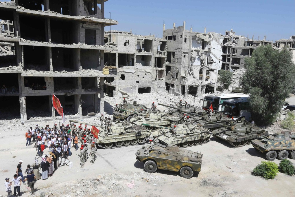 Actors on the sets of “Home Operation” in the Hajar al-Aswad neighbourhood of the Syrian capital Damascus on July 14. Photo: AFP