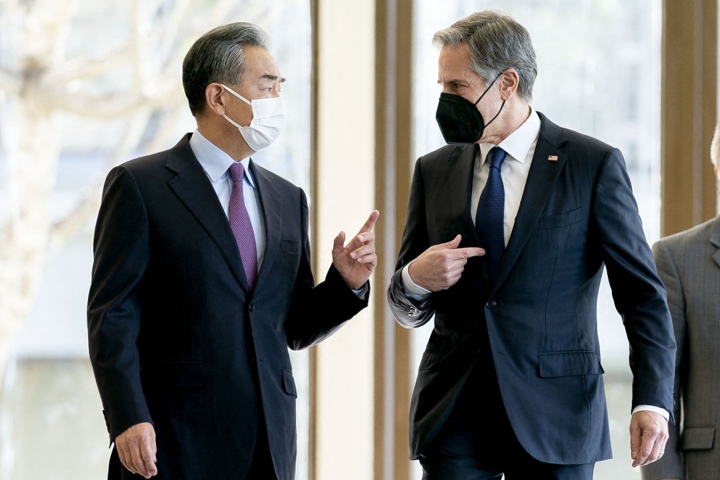 China’s Foreign Minister Wang Yi and US Secretary of State Antony Blinken talk before a meeting in Nusa Dua on the Indonesian resort island of Bali on July 9. Photo: AFP