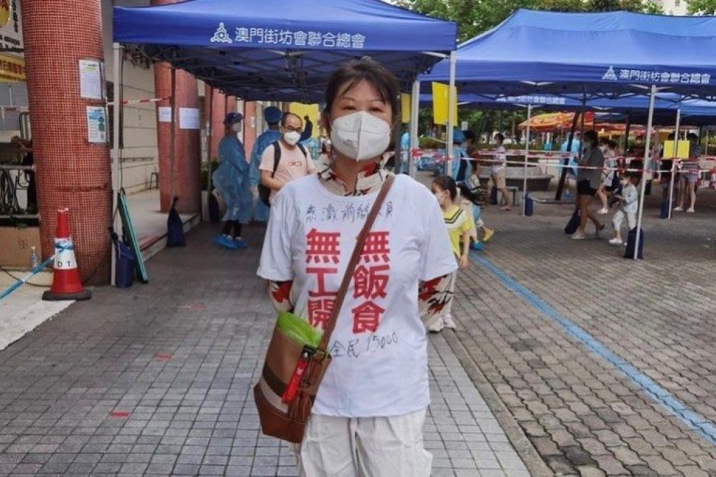 A woman in Macau wears a shirt with Chinese characters stating “no jobs, no food”, as well as messages of support for the government’s pandemic efforts. Photo: Handout