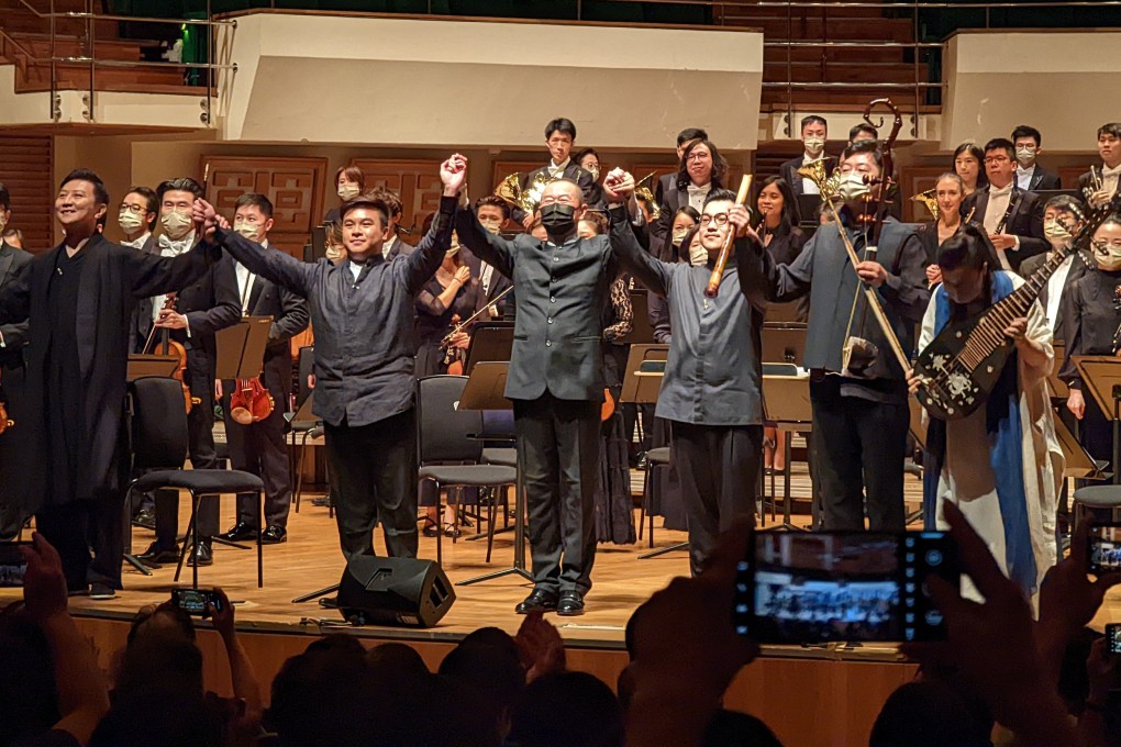 (Front, from left): Sheng/lusheng player Loo Sze-wang, bili/suona player Ling Kwan-leung, composer/conductor Tan Dun, chiba player Kenneth Sham, xiqin/zhonghu player Zhao Guanjie and five-string pipa player Gao Sijia after a performance of Tan’s The Five Muses of Dunhuang at the Hong Kong Cultural Centre on July 17. Photo: Kevin Kwong