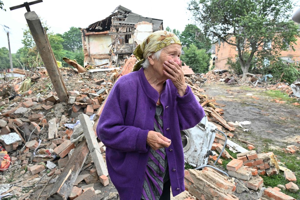 An elderly resident surveys the aftermath of shelling in the city of Chuguiv, east of Kharkiv, Ukraine. Photo: AFP