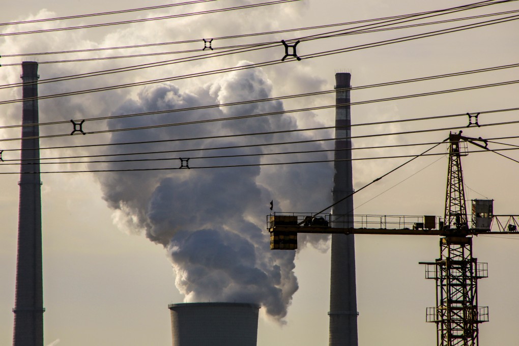 A coal-fired power plant is pictured near a construction site in Beijing. China’s quickened pace of approvals for new coal plants is a setback for the country’s climate goals, experts said. Photo: Reuters