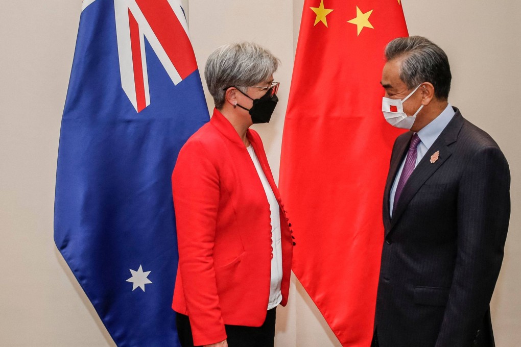 Australian Foreign Minister Penny Wong speaks with her Chinese counterpart Wang Yi at the G20 Foreign Ministers Meeting in Bali on July 8. Photo: AFP