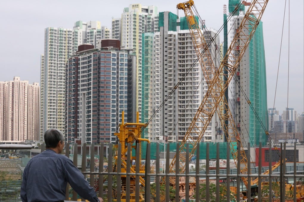 A construction site and residential buildings at Tak Long Estate in Kai Tak. Photo: Felix Wong