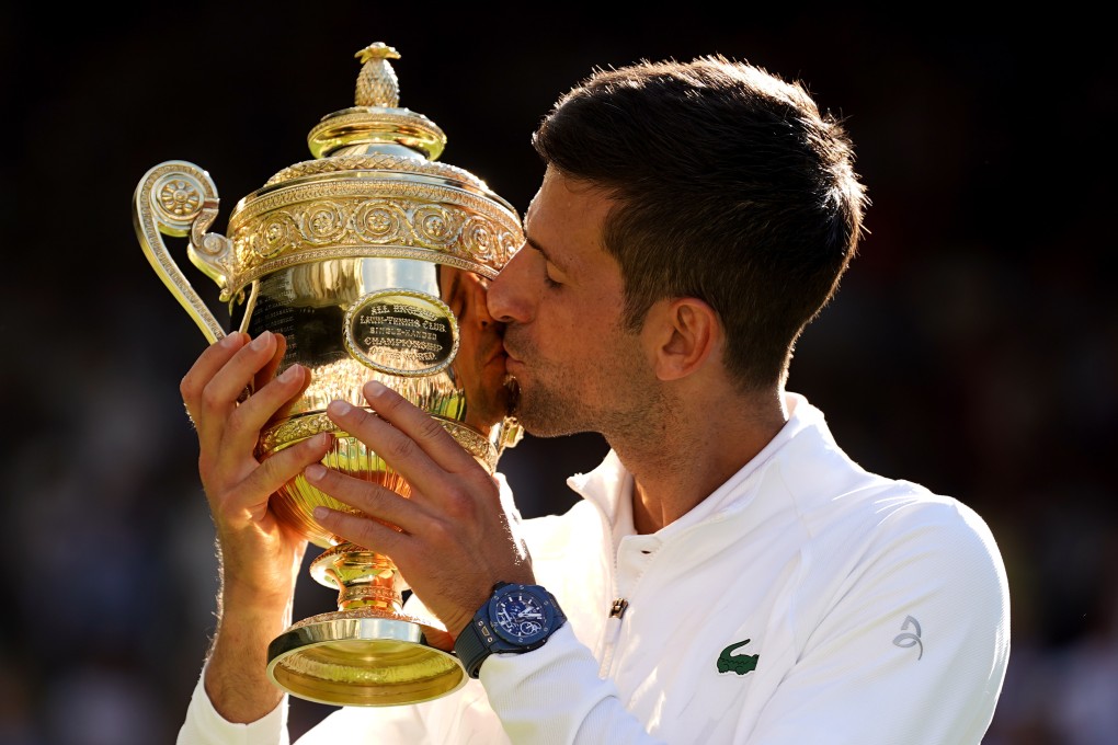 Novak Djokovic celebrates after beating Nick Kyrgios in their men’s singles final at Wimbledon. Photo: DPA
