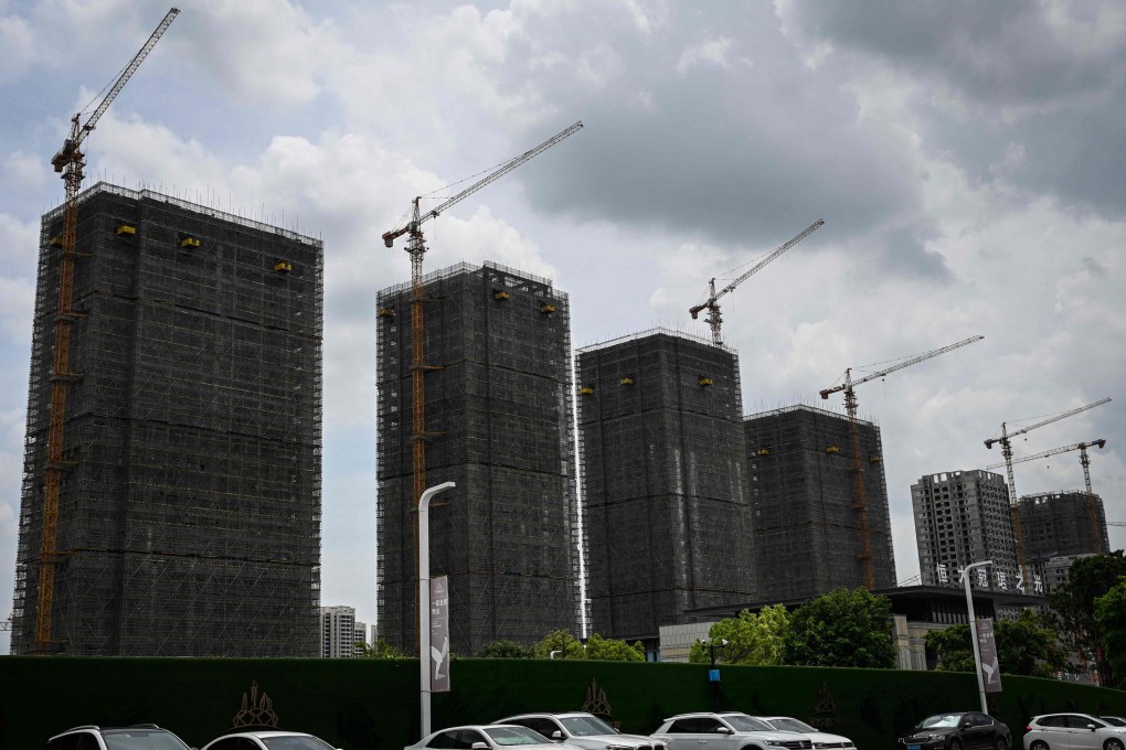 Residential buildings under construction in Guangzhou on July 18. Infrastructure investment is a central part of China’s attempt to revive slowing growth, but returns on that investment are not as good as in previous decades. Photo: AFP