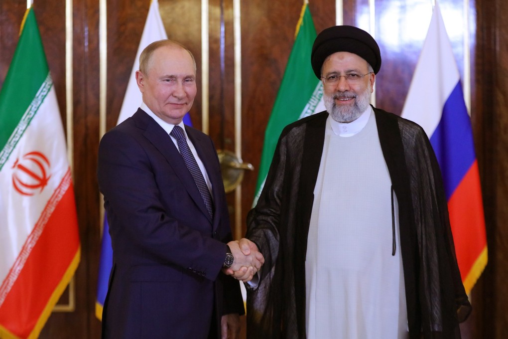 Iranian President Ebrahim Raisi (right) greets his Russian counterpart Vladimir Putin in Tehran on Tuesday. Photo: Iranian Presidential Press Service via EPA-EFE