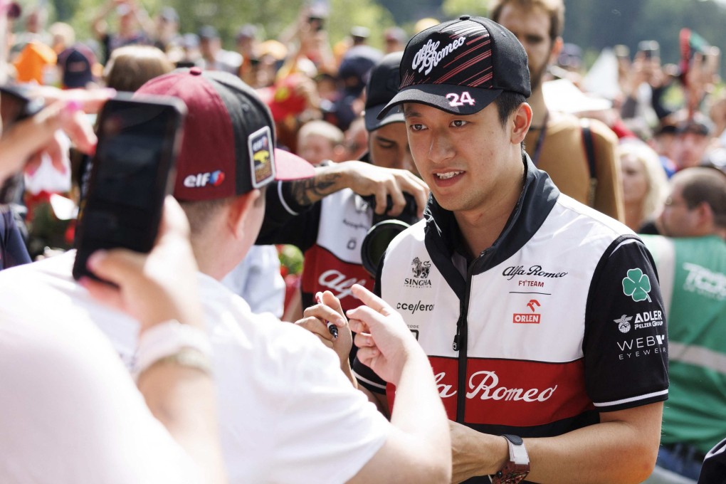 Alfa Romeo’s Chinese driver Zhou Guanyu signs autographs at the Styrian Green Carpet near the Red Bull Ring race track. Photo: AFP