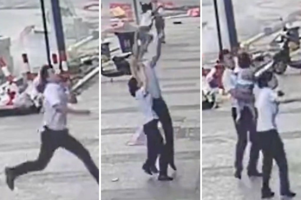 A man was caught on video catching a girl who had fallen out of her fifth-floor window. Photo: Weibo