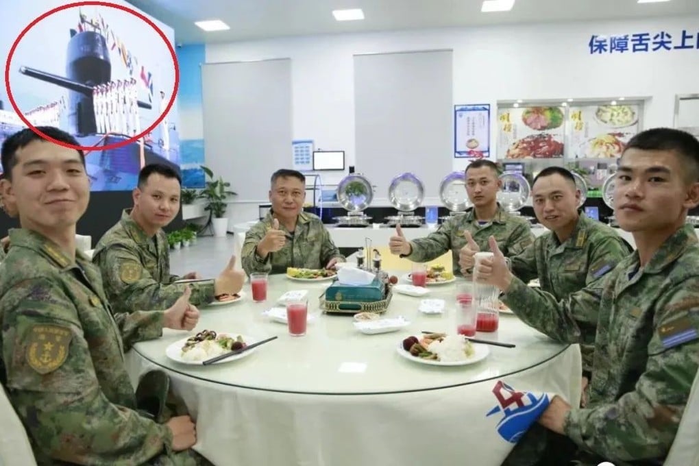A PLA report on a canteen for sailors in Ningbo included this image showing a handover ceremony for the new submarine in the background. Photo: qq.com