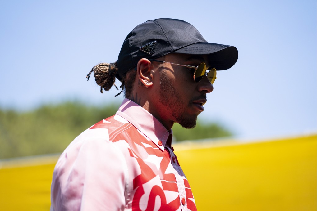 Lewis Hamilton arrives at the paddock during preparations for the French GP. Photo: dpa