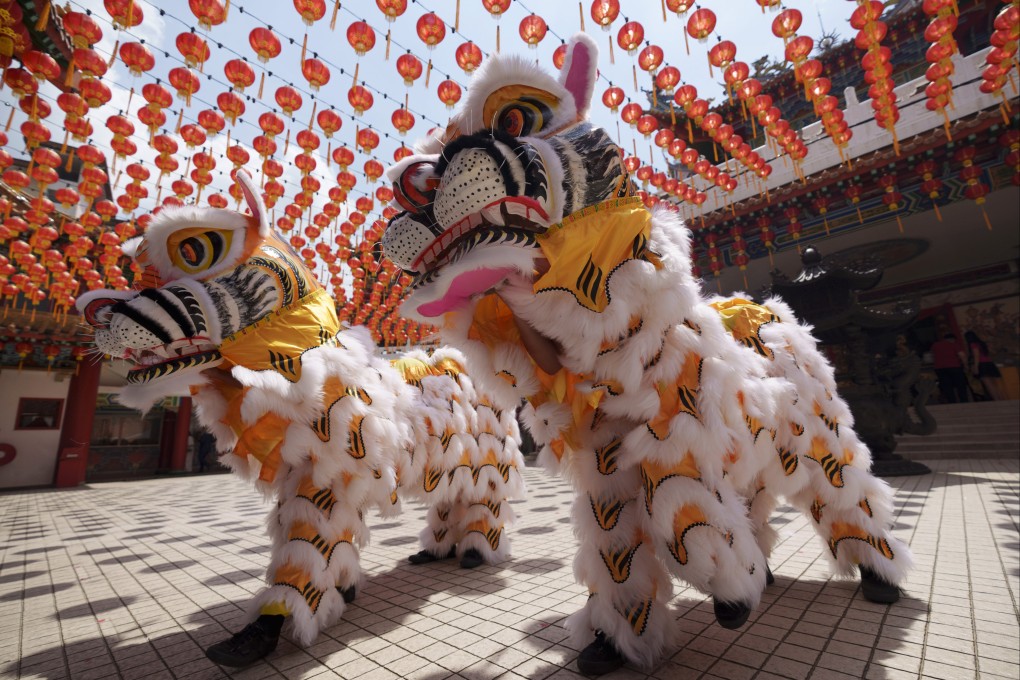 A Hainan Tiger Dance is performed ahead of the Lunar Year in Kuala Lumpur on January 21, 2022. File photo: AP