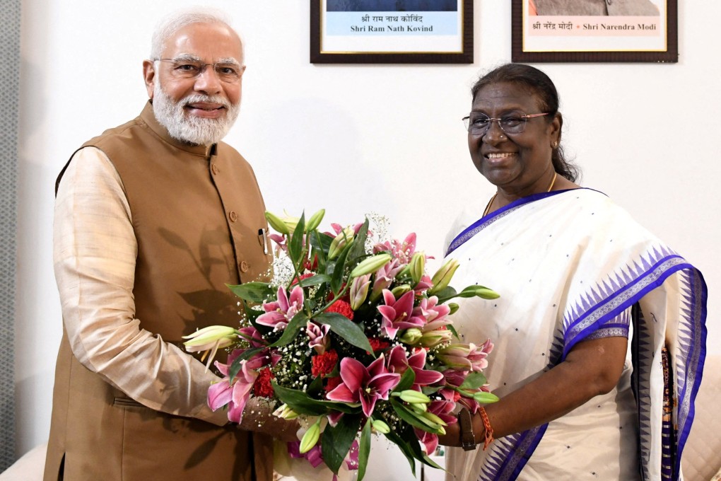 India’s Prime Minister Narendra Modi congratulates Droupadi Murmu in New Delhi on Thursday after she was elected as the country’s first president from the tribal community. Photo: India’s Press Information Bureau via Reuters