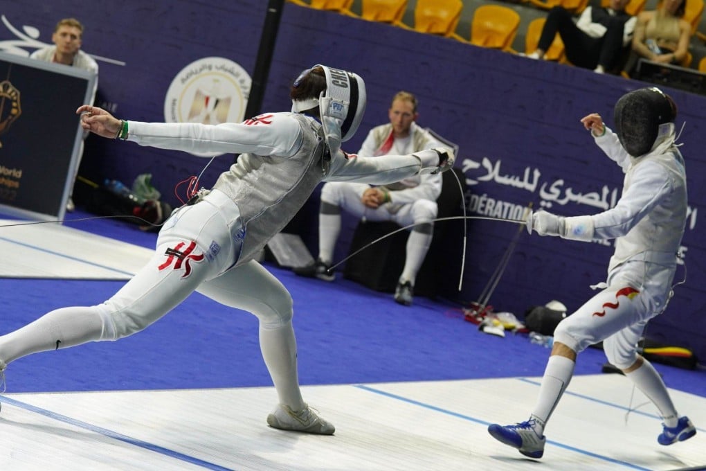Cheung Ka-long (left) in the round-of-32 clash against China. Photo: FIE