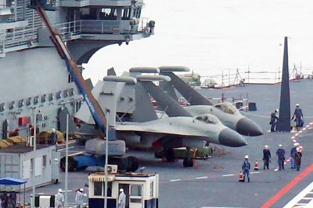 Two J-15D Roaring Shark aircraft on the deck of China’s Shandong aircraft carrier. Photo: Twitter