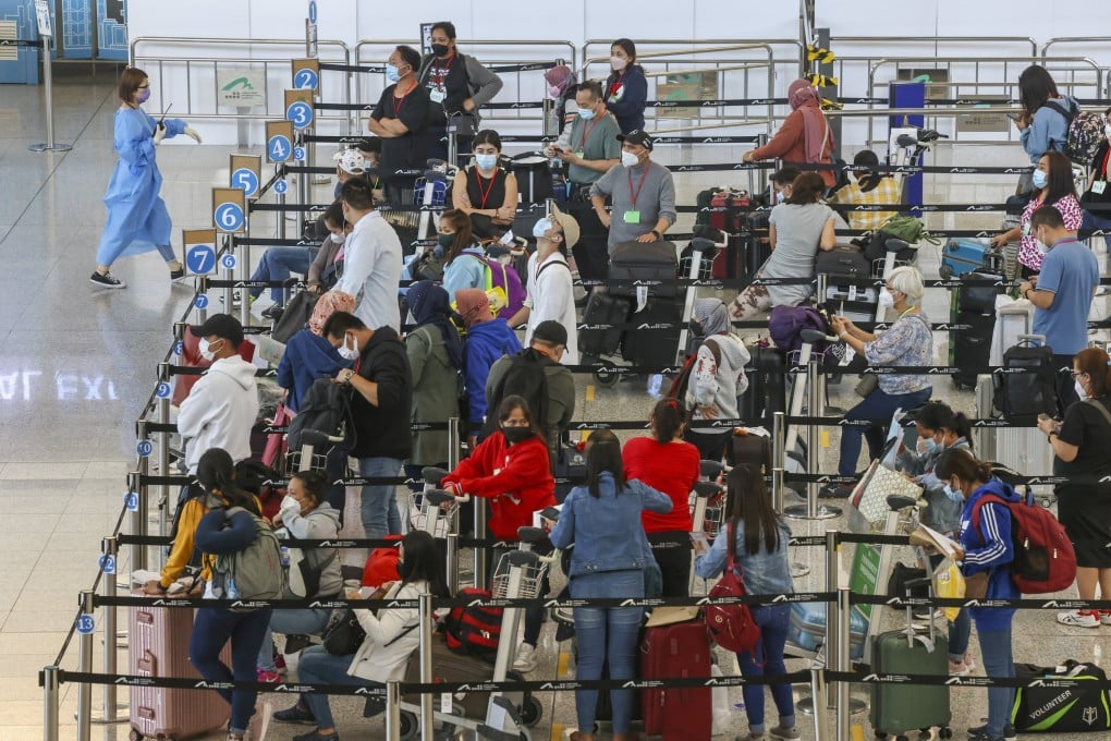 Arrivals at Hong Kong’s airport. Photo: K. Y. Cheng
