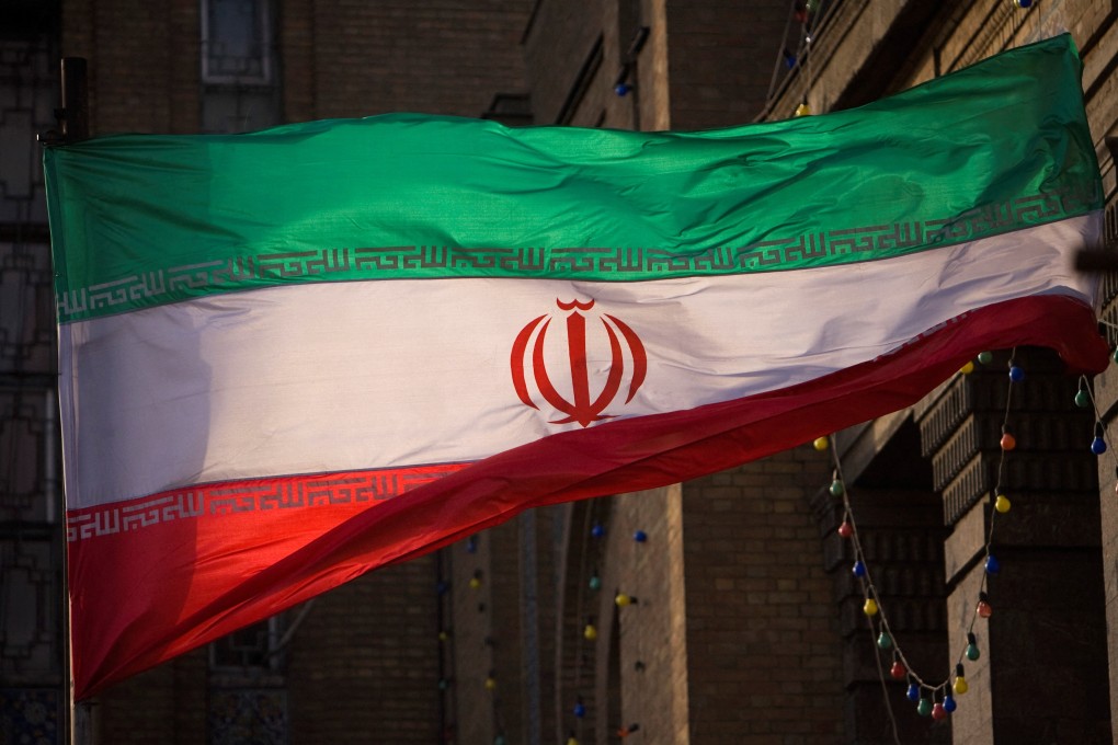 The Iranian flag in front of Iran’s Foreign Ministry building in Tehran. Iran claimed on Saturday that its intelligence agents dismantled a group linked to the Israeli spy agency Mossad. Photo: Reuters