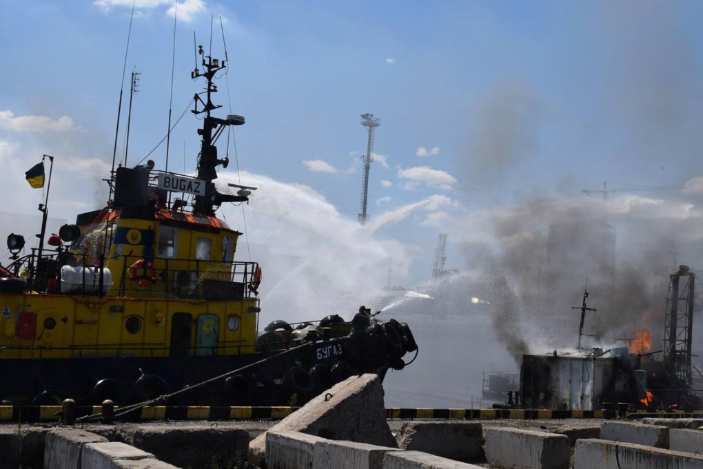 Firefighters work to put out a fire in a sea port of Odesa, southern Ukraine. Ukrainian authorities said that the fire at the port was caused by a missile attack. Moscow and Kyiv recently signed a landmark deal to aid grain exports and ease an international food crisis.  Photo: EPA-EFE/Odesa City Hall Press Office handout