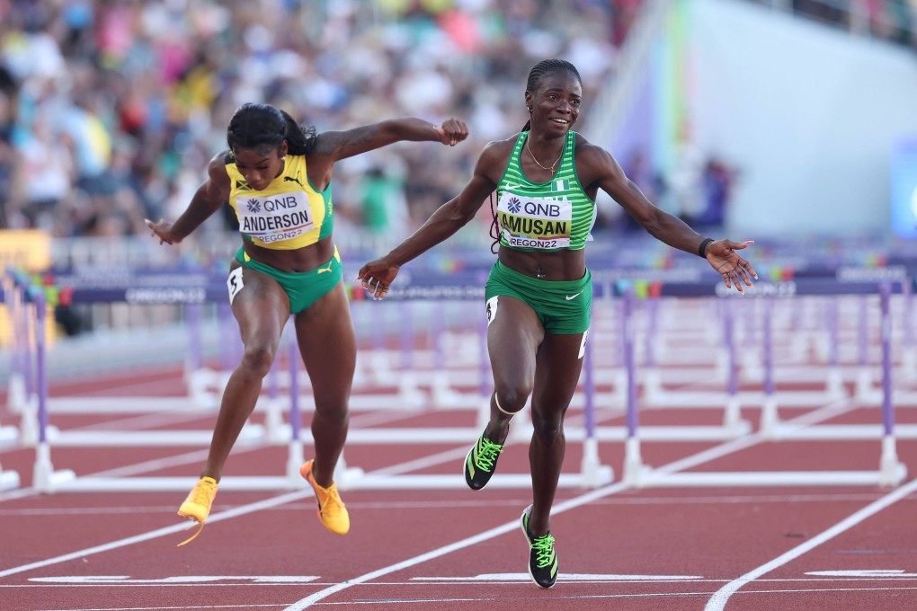 Tobi Amusan crosses the finish line ahead of Jamaica’s Britany Anderson to win the women’s 100m hurdles. Photo: AFP