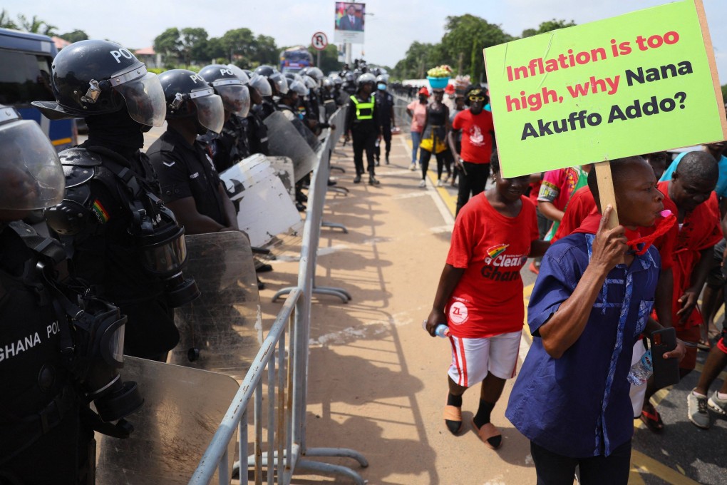Protesters march towards the presidential palace on June 29 on the second day of a demonstration over soaring living costs in Accra, Ghana. Hit by the global pandemic and fallout from the war in Ukraine on fuel and food prices, Ghana is in talks with International Monetary Fund to help stabilise its public finances. Photo: AFP