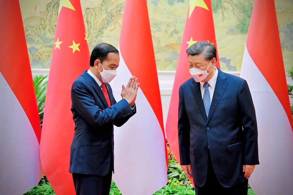 Indonesian President Joko Widodo greets his Chinese counterpart Xi Jinping in Beijing on Tuesday. Photo: Handout via Reuters
