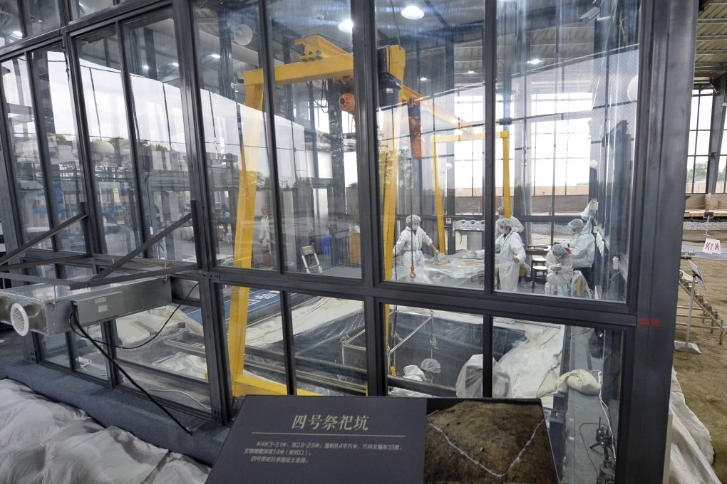 Glass cabins are kept at 20 to 25 degrees Celsius and at 80 per cent humidity during the excavation work. Photo: Xinhua