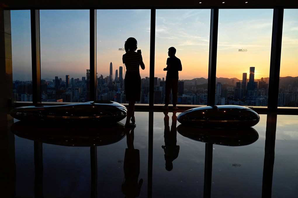 Unlike in March, when Shenzhen enforced a seven-day lockdown during a fresh outbreak, most parts of the city at present are operating normally with no disruptions to public transport and various services-related businesses. Photo: Agence-France Presse