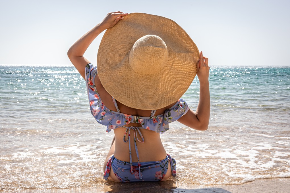 Having a skincare routine for summer is important. Experts weigh in on how to perfect yours  - including why you need a hat or to apply sunscreen to your scalp. Photo: Shutterstock