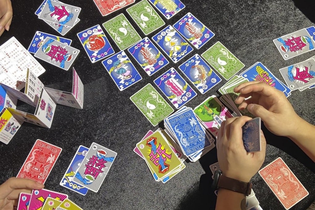 Players have a game of Daai Da Bin Lo (Big Hotpot Game), developed by three Hong Kong creatives to highlight Cantonese culture and preserve slang terms and phrases. Photo: Daai Da Bin Lo