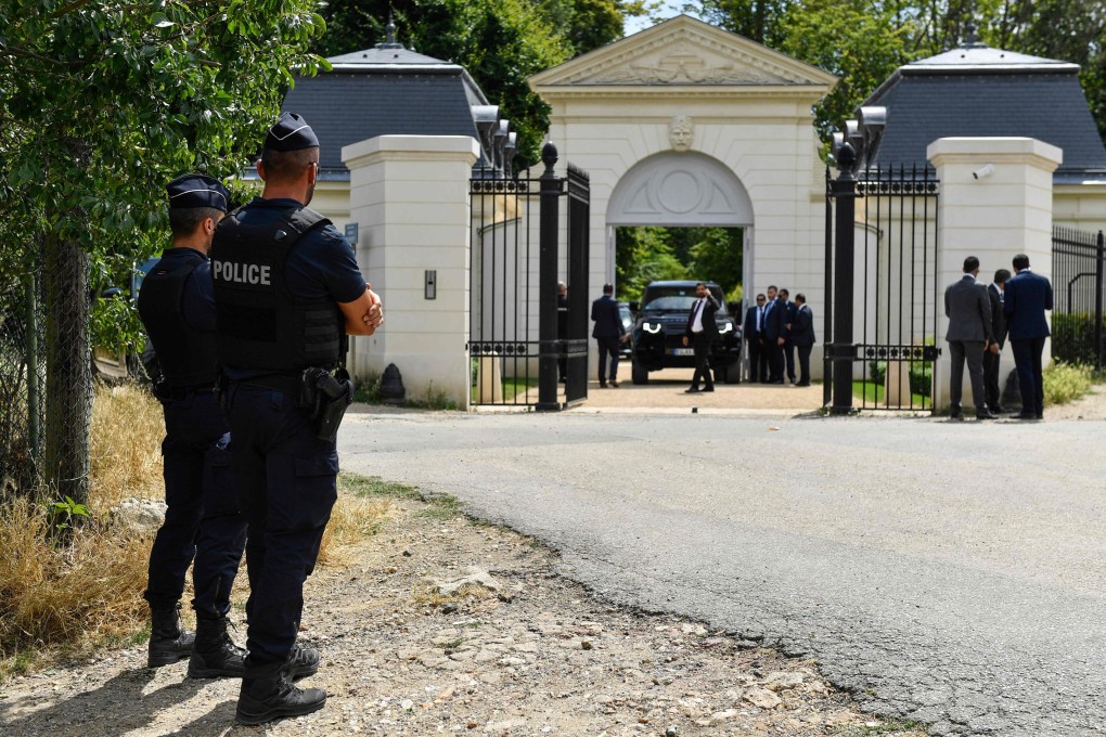 French police officers stand guard outside the Chateau Louis XIV mansion belonging to Saudi Crown Prince Mohammed bin Salman in Louveciennes on Thursday. Photo: AFP