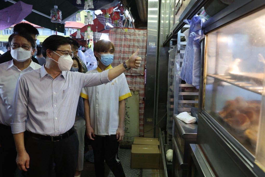 Chief executive John Lee visits businesses in Sham Shui Po on July 30.
Photo: Yik Yeung -man