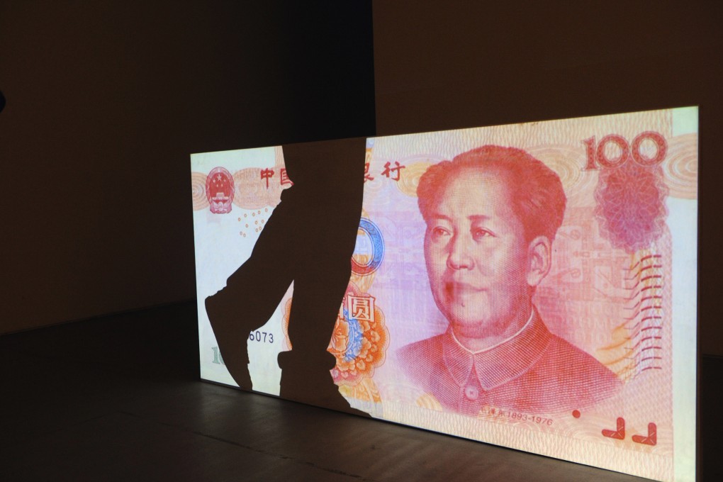 China’s shadow banking sector, which was estimated at US$12.9 trillion in 2019, had shrunk by US$4.3 trillion at the end of June. Photo: AFP