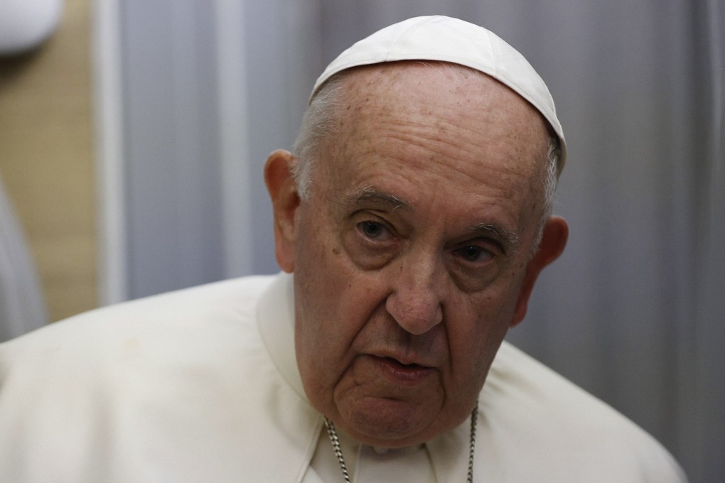 Pope Francis holds a news conference aboard the papal plane on his flight back after visiting Canada on Saturday.  Photo: EPA-EFE/Pool
