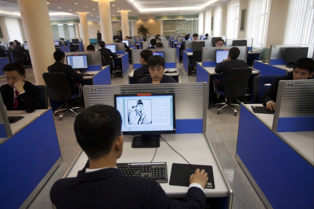 North Koreans work on computers in a library at Kim Il-sung University in this 2011 file photo. Photo: AP