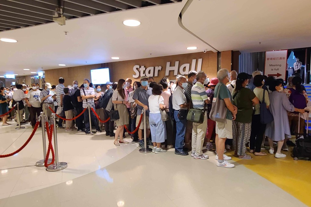 HSBC minority shareholders queueing to enter the hall to meet HSBC’s senior executives at the International Conference and Exhibition Centre in Kowloon Bay on August 2, 2022. Photo: Enoch Yiu