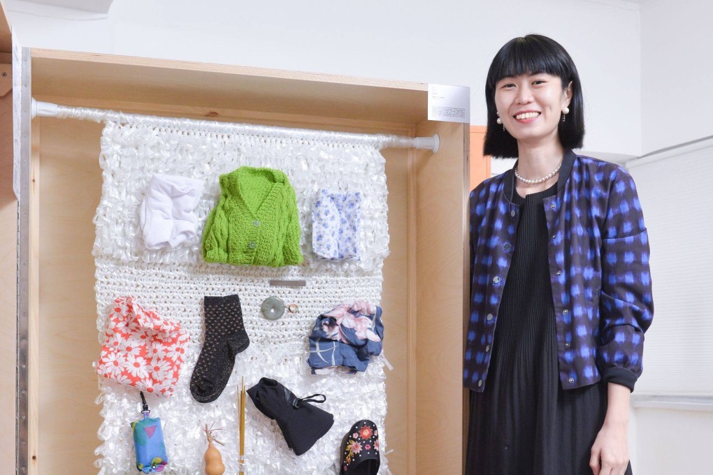 Zoe Siu, programme curator of the mobile exhibition “Come’n Chill at Wanchai”, which celebrates Wan Chai’s street markets, with trinkets gathered from the stalls. Photo: Come’n Chill at Wanchai
